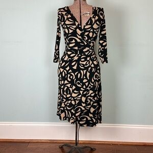 Elegant Black and Cream Wrap Dress